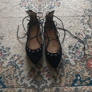 Lace-up black flats